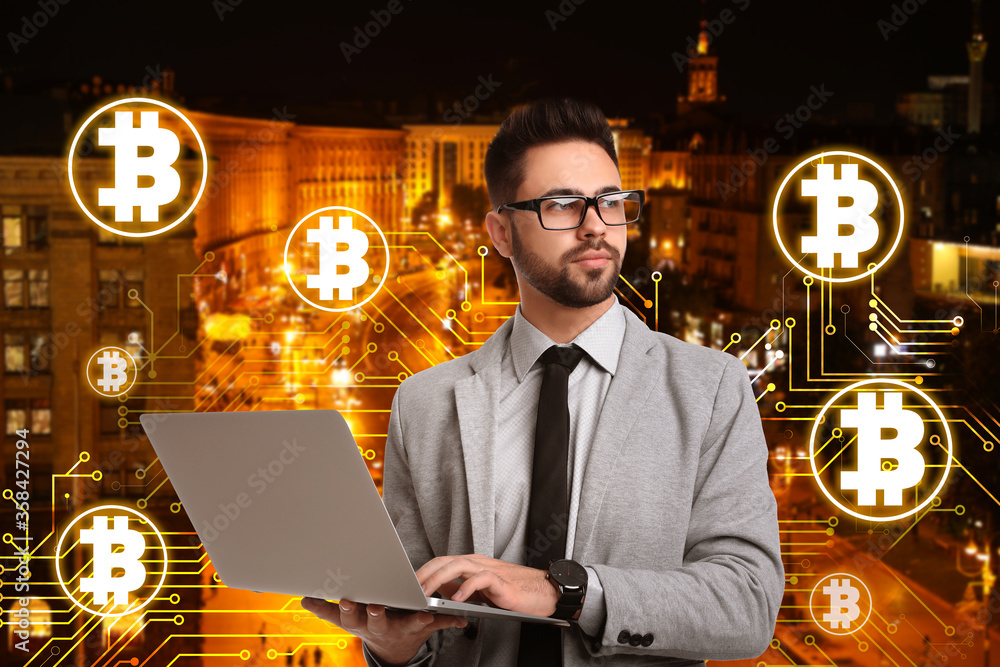 Poster fintech concept. scheme with bitcoin symbols and businessman using laptop on cityscape background