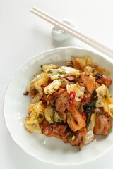 Korean food, chicken and cabbage stir fried with gochujang