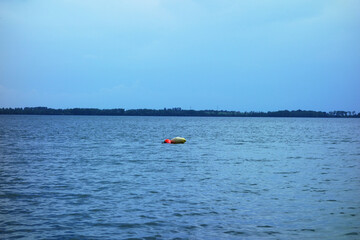 The floating buoy serves as an anchor for ships