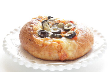 Black olive and cheese bread on white dish for breakfast