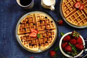 Homemade Chocolate chip waffles with strawberries
