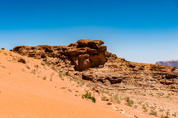 Fototapeta na wymiar It's Nature and rocks of Wadi Rum (Valley of the Moon), Jordan. UNESCO World Heritage