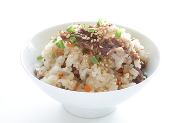 Japanese food, beff and carrot mixed rice with sesame and spring onion