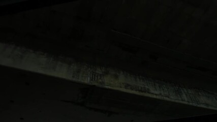 MONTREAL CANADA - March 12 2018 Worms eye tracking shot traveling under the turcot interchange highway bridge. Old and aging cement infrastructure. - Powered by Adobe