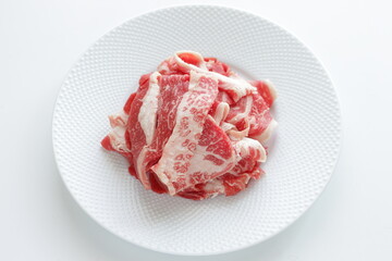 Freshness Japanese marble beef slices on white plate with copy space