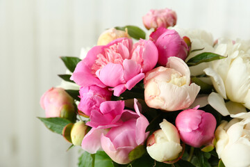Bouquet of beautiful fresh peonies indoors, closeup