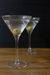 Martini glasses and on wooden table