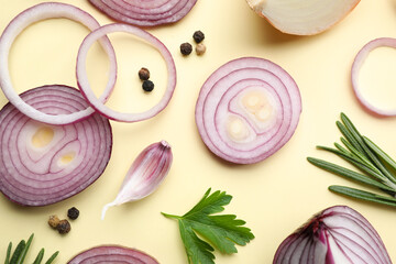 Flat lay composition with onion and spices on beige background