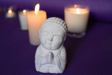 Candles and buddha in relaxation space