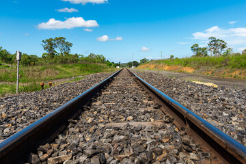 Rail tracks in Queensland countryside during summer