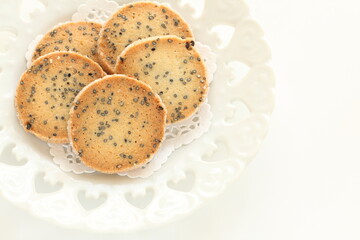 Homemade black sesame cookie on dish with copy space