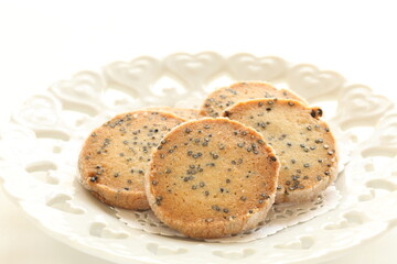 Homemade black sesame cookie on dish with copy space