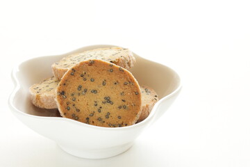 Homemade black sesame cookie on dish with copy space