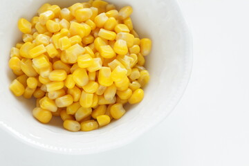 Prepared sweet corn on white background with copy space