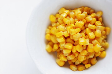 Prepared sweet corn on white background with copy space