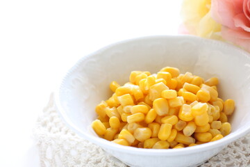 Prepared sweet corn in bowl with copy space