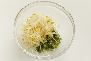 Korean cooking, boiled soy bean sprout and seasoning, green onion
