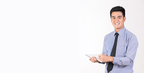 Young businessman record data for work and the bright smiley faces.