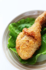 fried chicken on lettuce with copy space