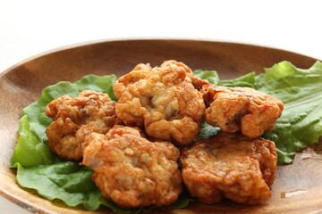 Chinese food, fish cake on lettuce with copy space