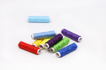 threads and buttons of various colors