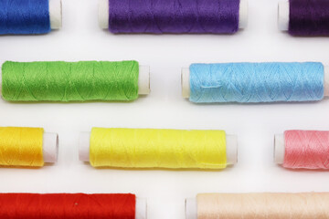 threads and buttons of various colors