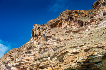 It's Rocks in front of the blue sky