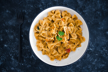 plant-based food, vegan garlic tahini sauce pasta with mediterranean vegetables