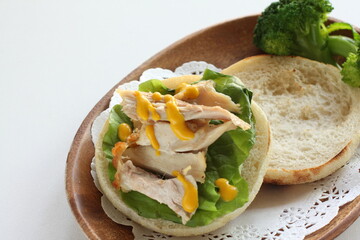 Chicken and mustard sauce in English muffin sandwich for comfort breakfast 