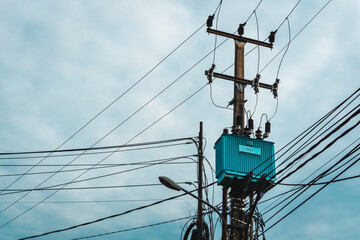 Pole-mounted distribution transformer used to provide 