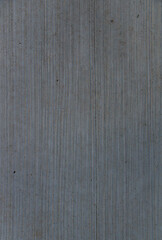 Background texture of concrete with textured brushed finish. Light gray brush concrete texture. Concrete pavement. Gray cement slab texture