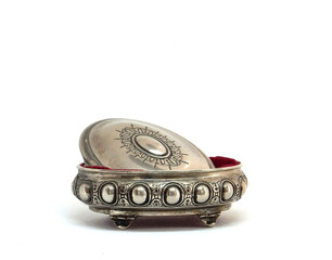 silver jewelry box with red velvet inner side.Isolated on white.