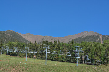 Fototapeta premium Ski Lifts on the ski slopes of Arizona Snowbowl on Mount Humphreys near Flagstaff, Arizona USA