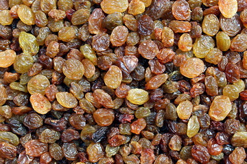 Texture raisins light brown for healthy nutrition with place for text