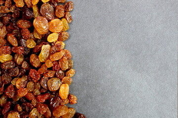 Texture raisins light brown for healthy nutrition with place for text