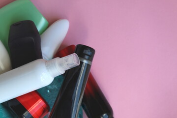 A bunch of plastic bottles with cosmetic creams and lotions