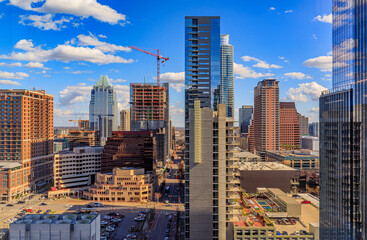 Modern office buildings of tech firms downtown with the famous Frost Bank Tower in the background...