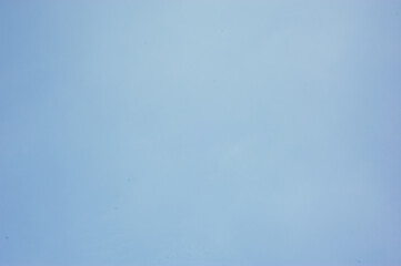 The background image of bright blue sky