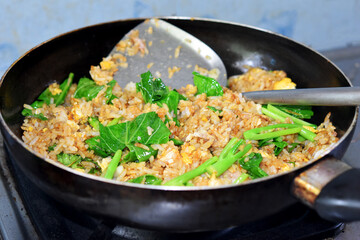 Pork fried rice with kale and tasty eggs