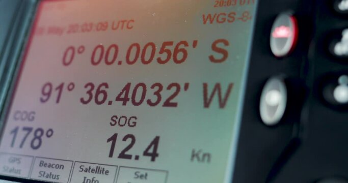Closeup of GPS changing over latitude and longitude after crossing the equator