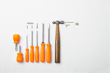 Basic hand tools set, screwdrivers, hammer, nails and screws. 