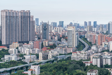 Fototapeta na wymiar Modern city skyline and viaduct, the fast city transportation BRT in Xiamen city, Fujian, Chian