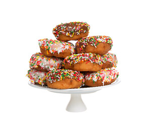 Pile of cake donuts frosted in chocolate and vanilla with candy sprinkles on white pedestal isolated on white.
