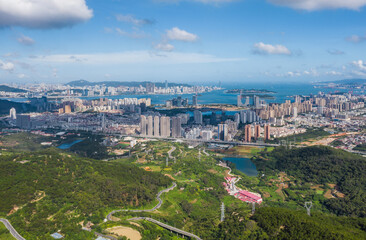 Fototapeta na wymiar Aerial view of Cityscape with blue sky and buildings in Haicang New District, Xiamen City, Fujian Province
