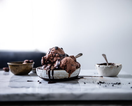 Double Chocolate Mochi Bit Ice Cream With Black Sesame Fudge Sauce