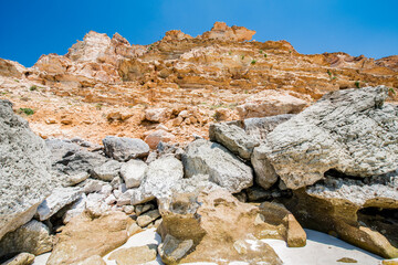 It's Stones on the calm coast of the ocean