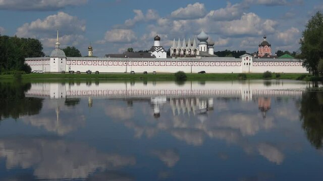 View of the Tikhvin assumption monastery from lake Tabora on a July day. Leningrad region, Russia 