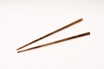 wooden chopsticks on white background