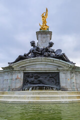 Victoria Memorial and fountain in front of the Buckingham Palace, royal residence of the British Monarchs in London UK