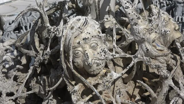 Demon Head in the design of the White temple (Wat Rong Khun). Chiang Rai